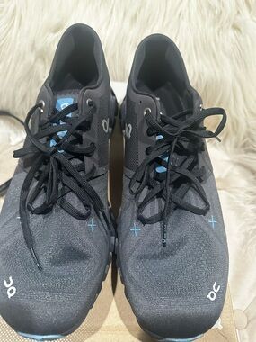 On Running Men's Black Athletic Sneakers with Light Blue Accents